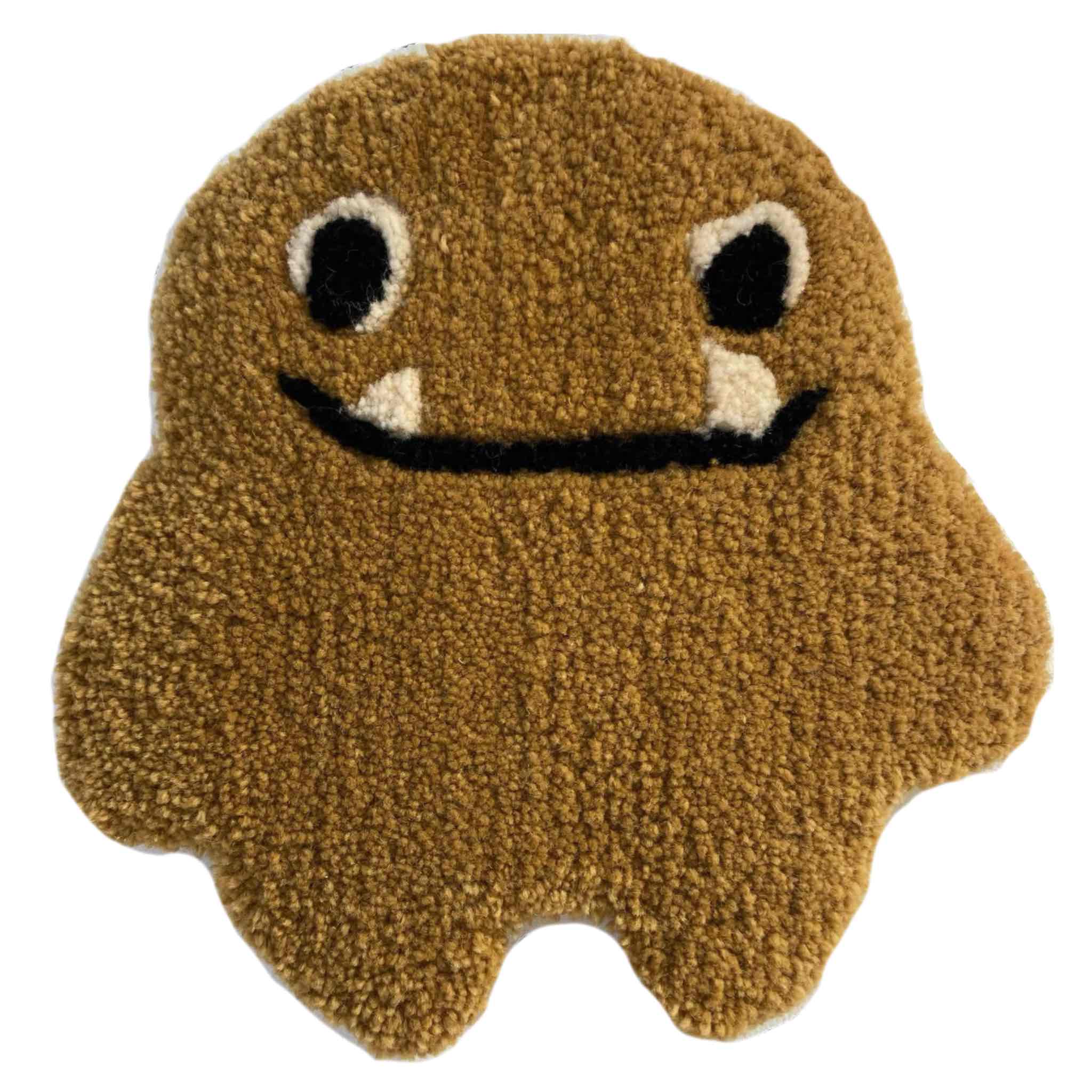 mustard monster tufted wall art